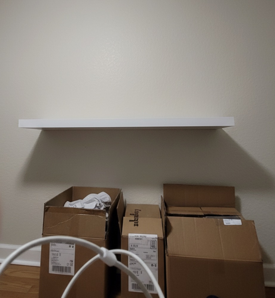 laminated mdf floating shelves next to solid wood floating shelves